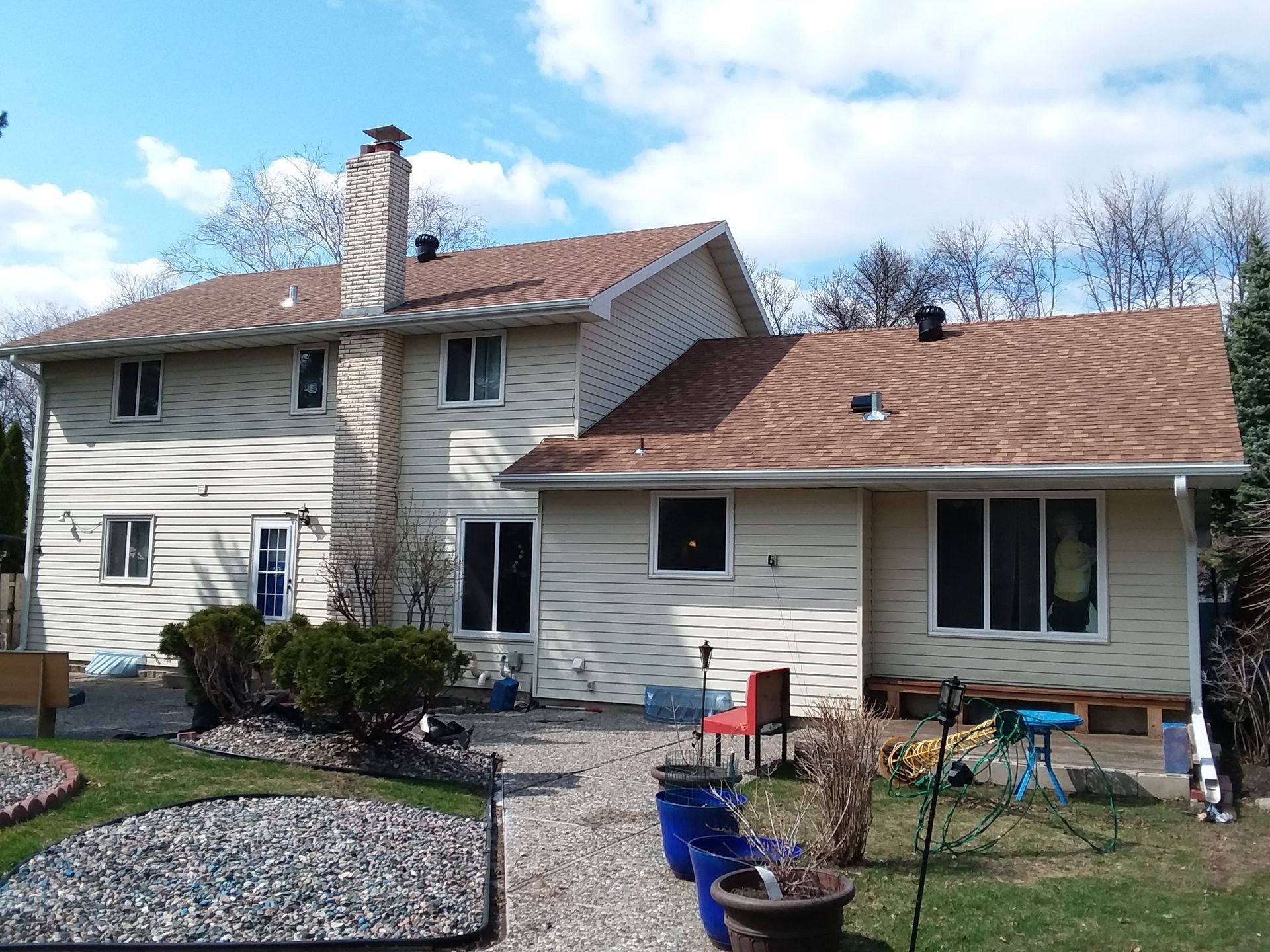 Final install inspection for an Ada, Minnesota architectural asphalt roof installed using whirlybird turbine ventilation