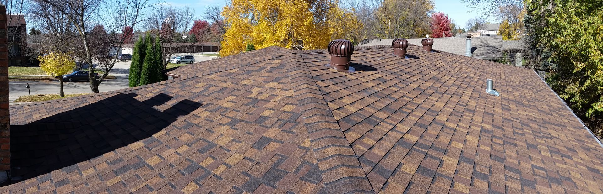 Completed Asphalt Shingle Roof with Brown Turbine Vents in Lake Park, MN