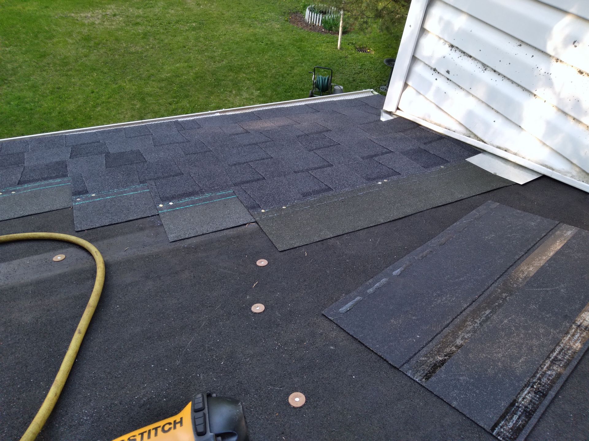 Moire Black Landmark Asphalt Shingles with Metal Flashing on a House Addition near West-Fargo-ND and Moorhead-MN