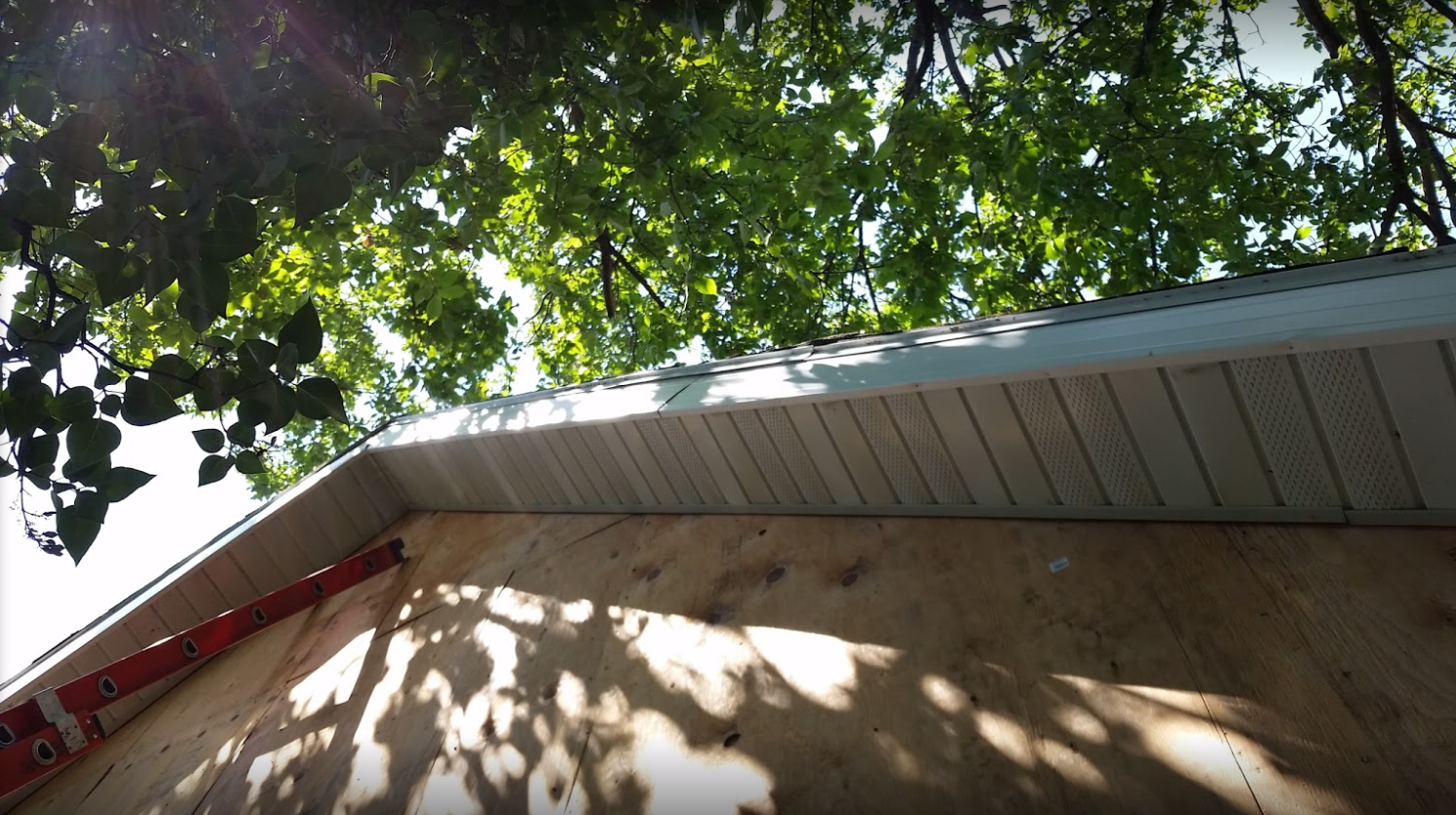 White Aluminum Soffit and Fascia Installed on Edge of Detached Garage Roof in Page-ND