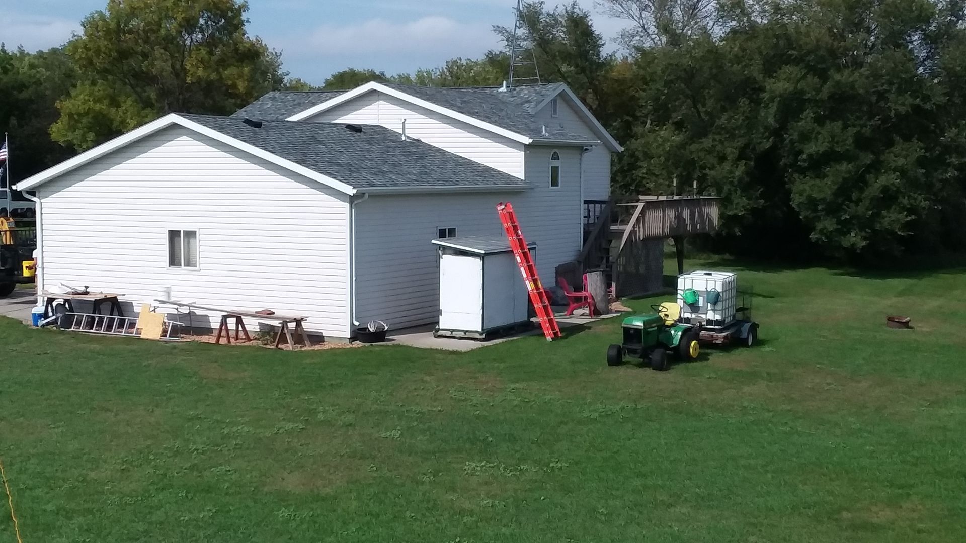 CertainTeed Class 4 impact rated roof in color granite gray on a white colored residential house in Fergus Falls Minnesota