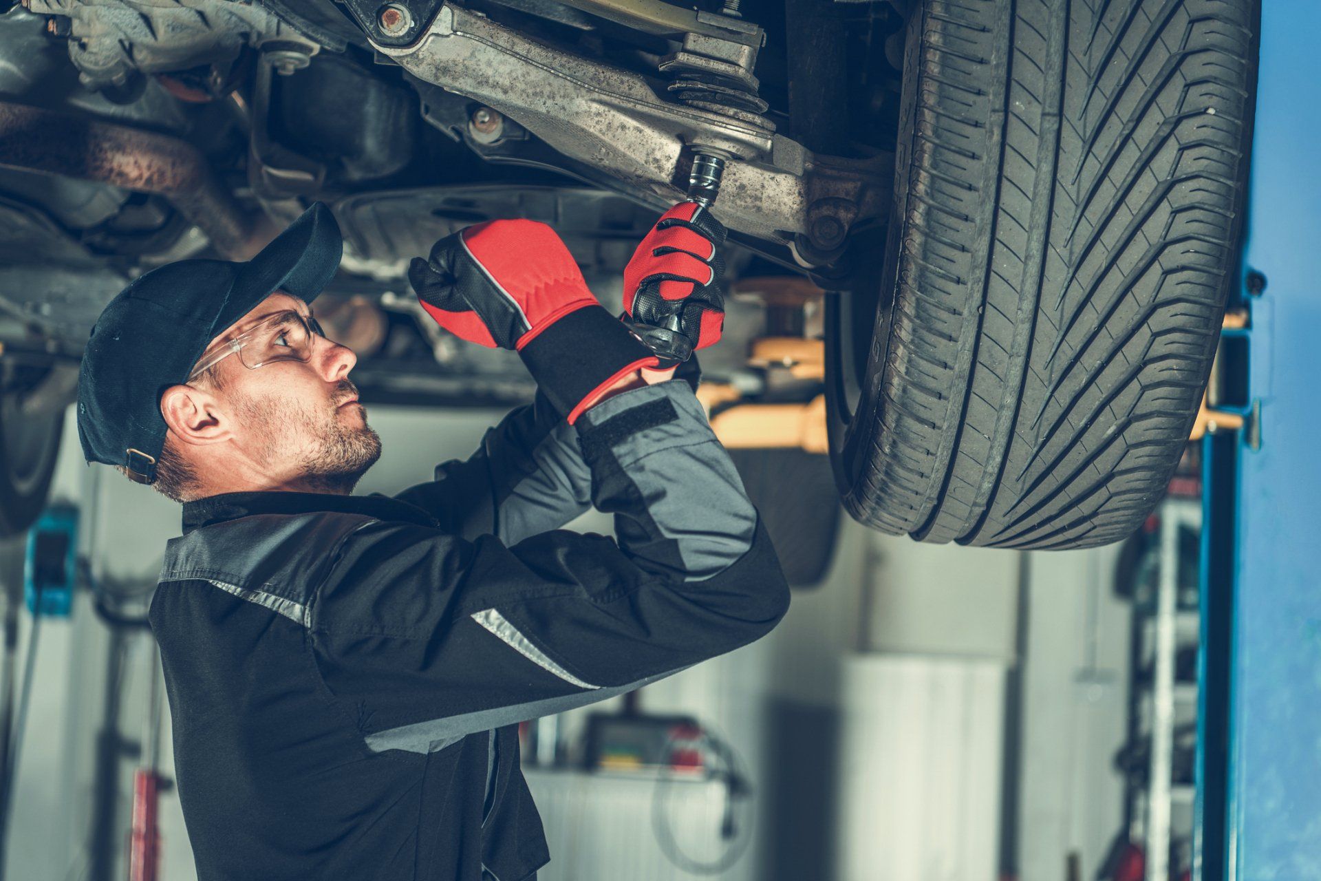 A Car Mechanic — Iowa City, IA — Professional Muffler Inc A Car Mechanic — Iowa City, IA — Professional Muffler Inc