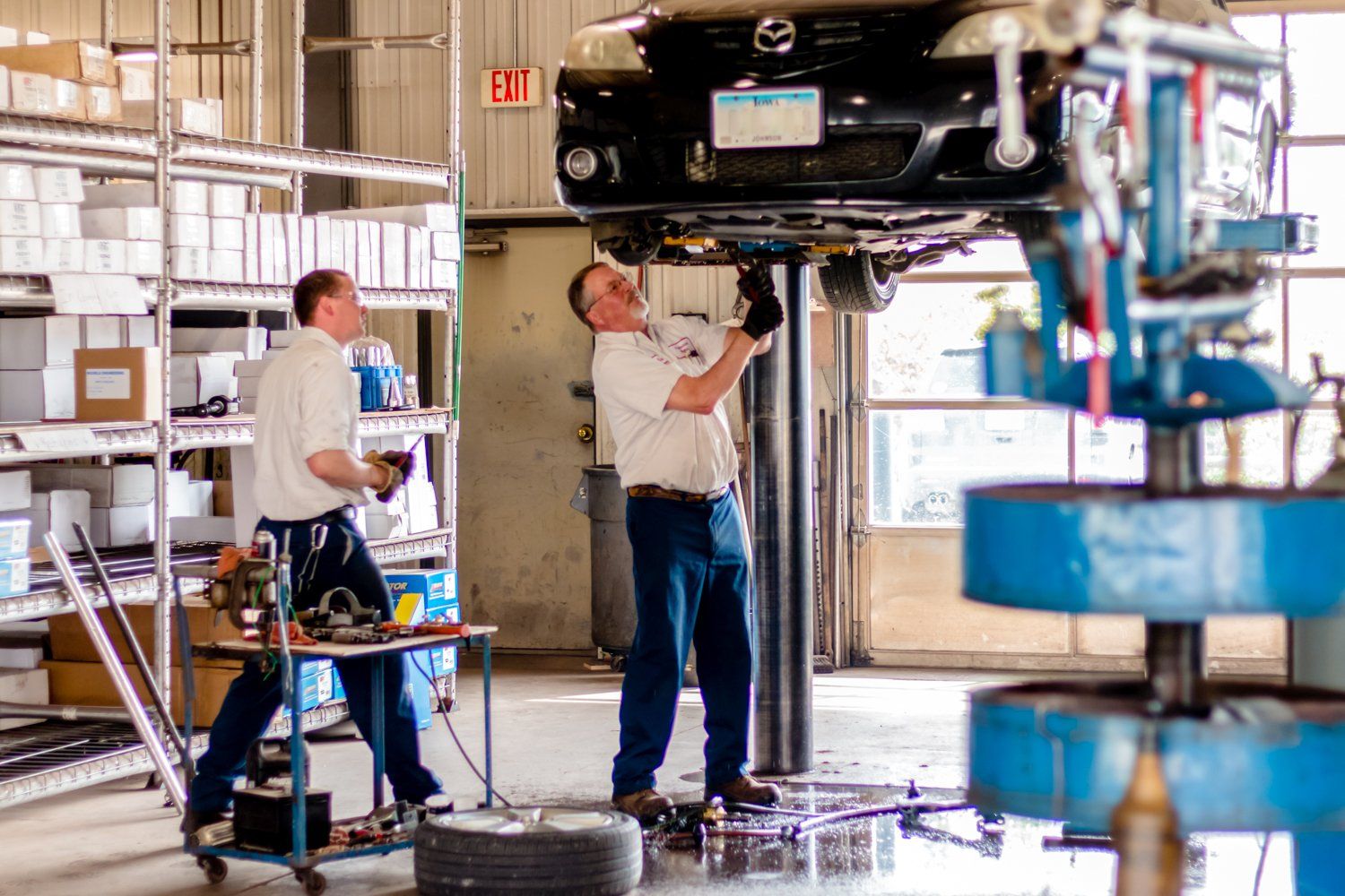 Car Under Maintenance — Iowa City, IA — Professional Muffler Inc