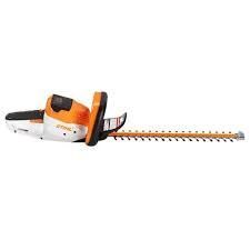 a stihl hedge trimmer is shown on a white background .