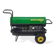 a green and black john deere heater on wheels on a white background .