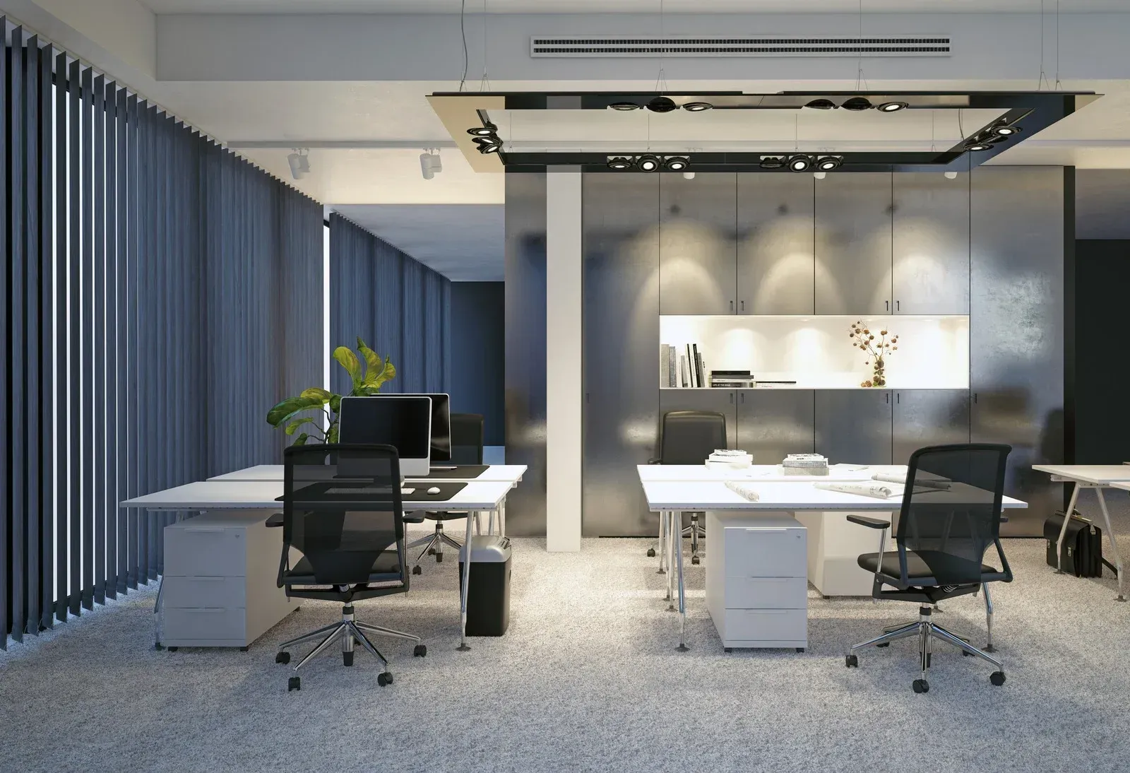 A modern office with a lot of windows and tables and chairs.