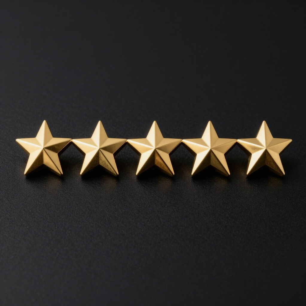 Five gold stars in a row on a dark background