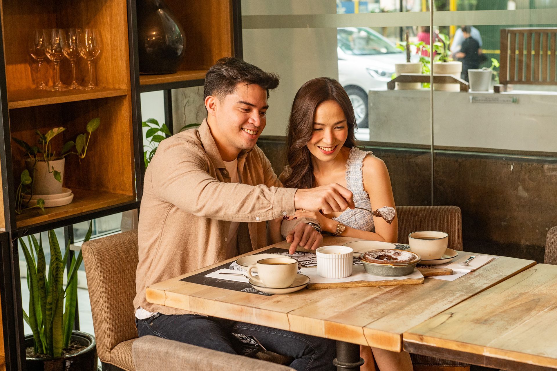 Couple enjoying in-room dining at The Picasso Boutique Serviced Residences, Makati