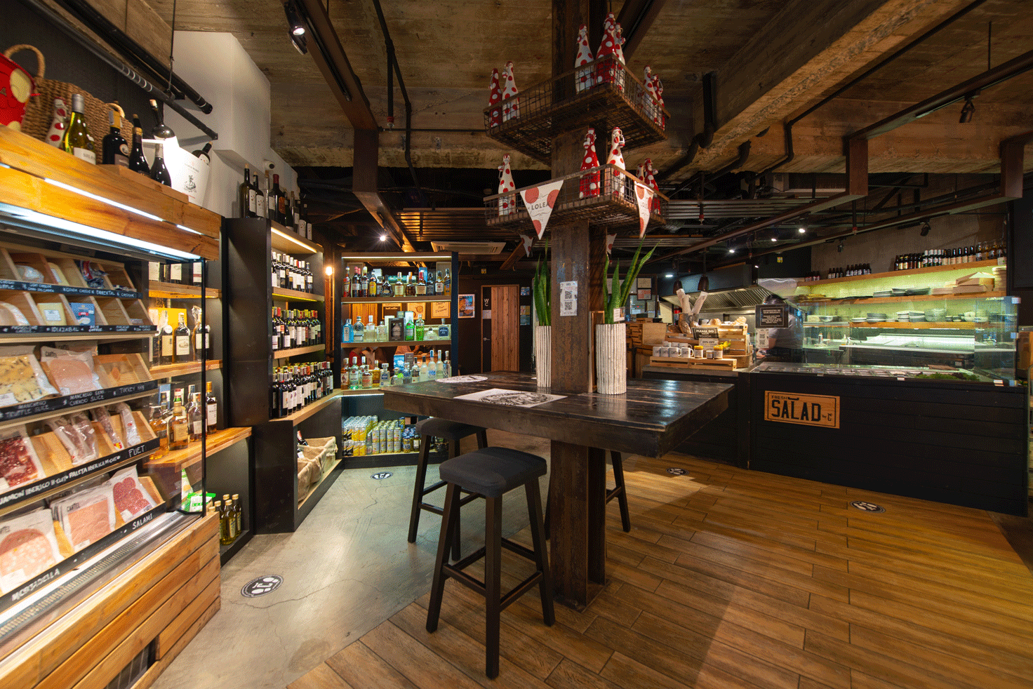Rustic deli and wine shop interior at The Picasso Boutique Residences Makat