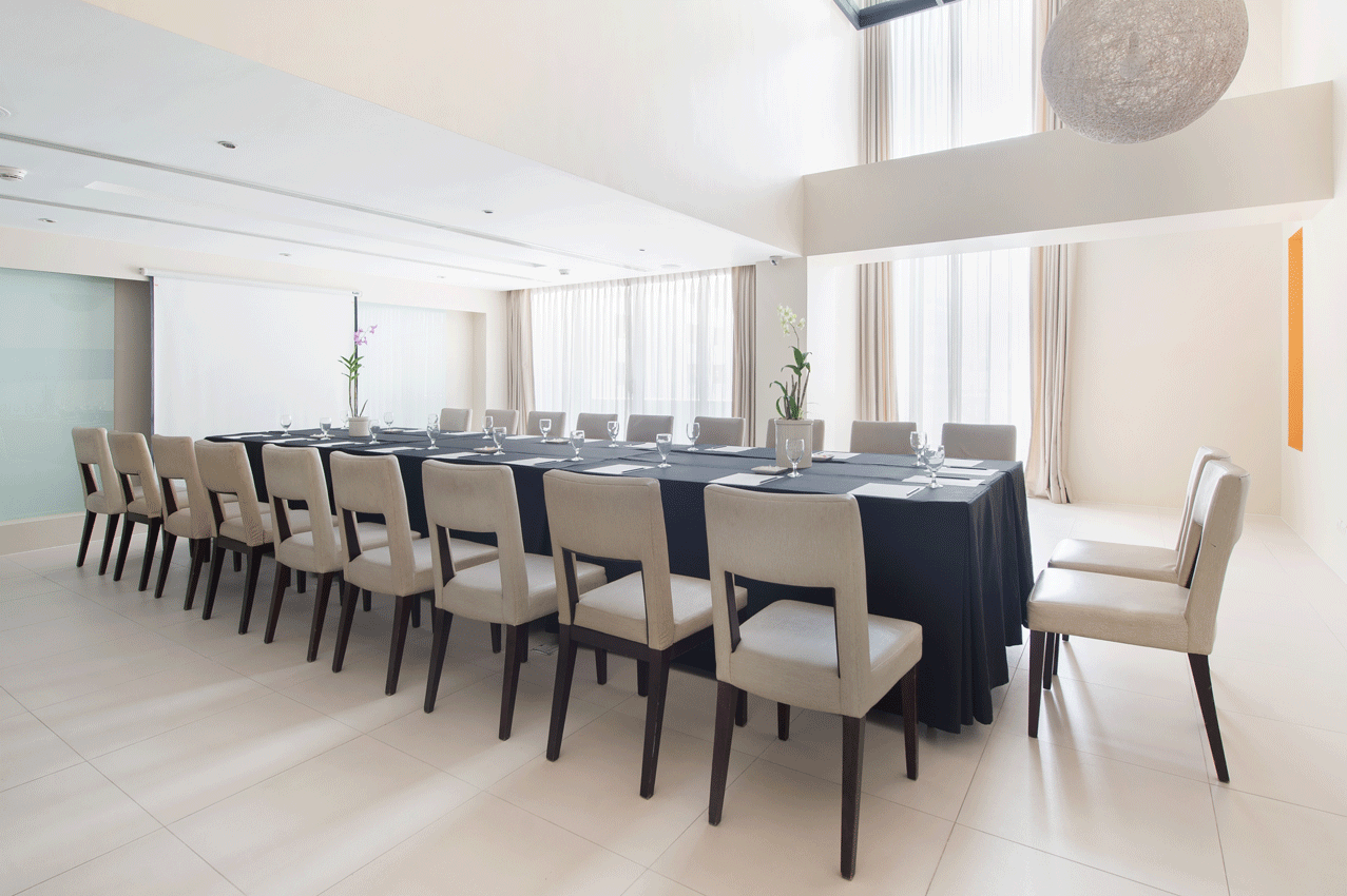 Modern hotel conference room with long table at The Picasso Boutique Reside