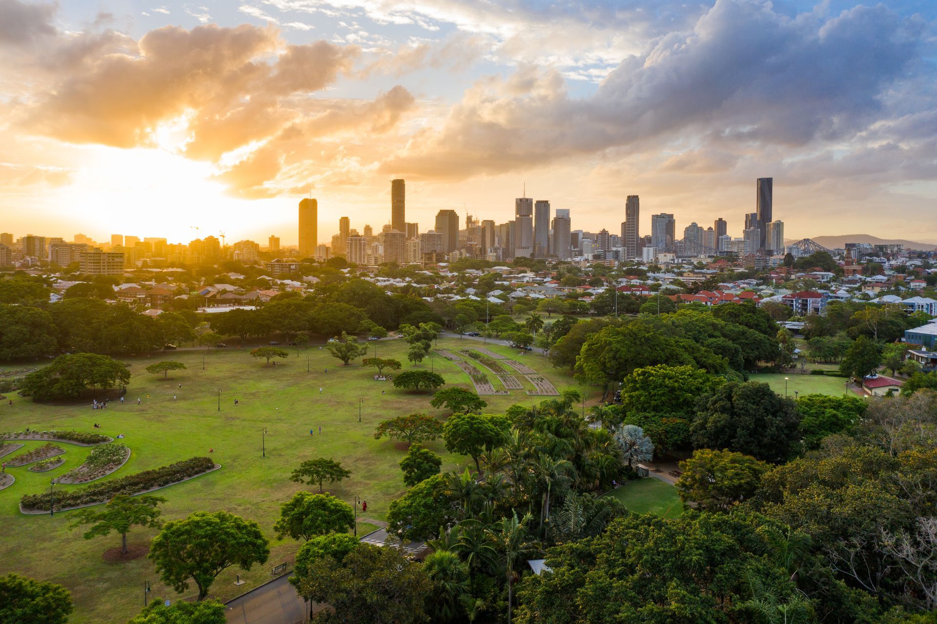 Sunset Over a City Skyline With Green Park in the Foreground — QA Oxley in Seventeen Mile Rocks, QLD