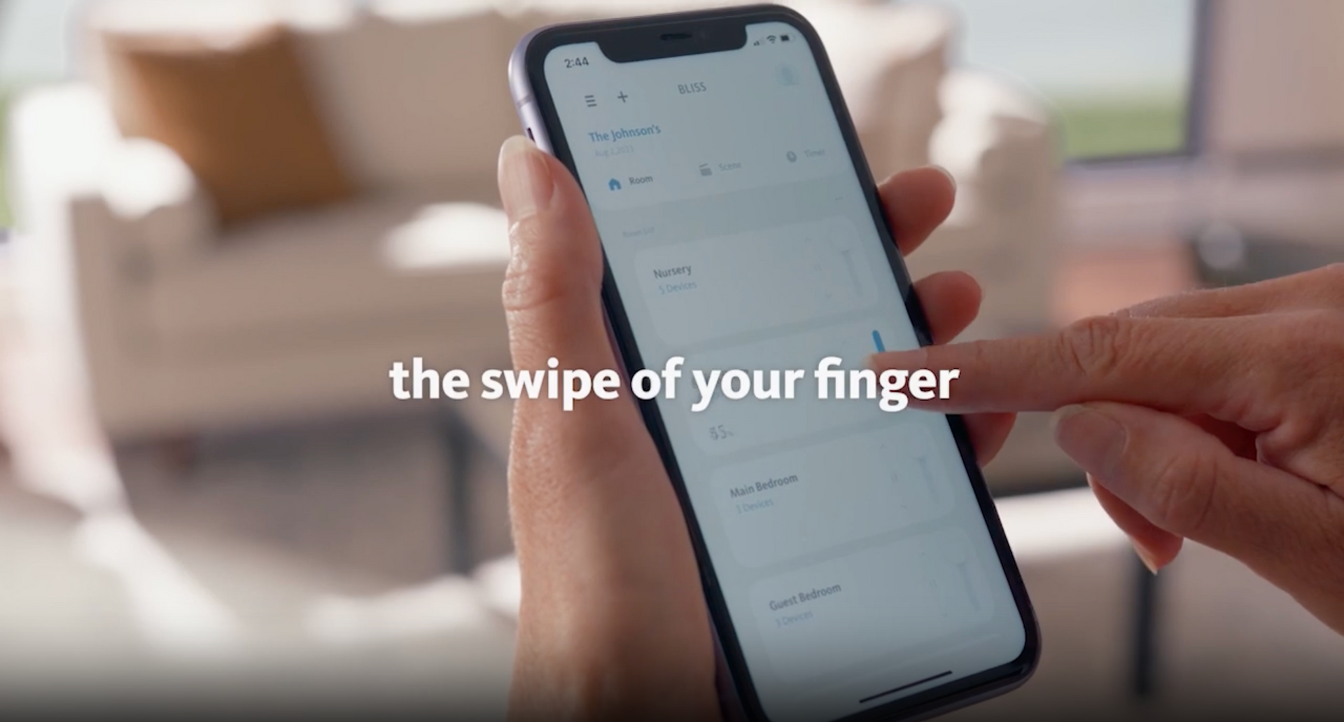 A person is holding a cell phone in their hand.
