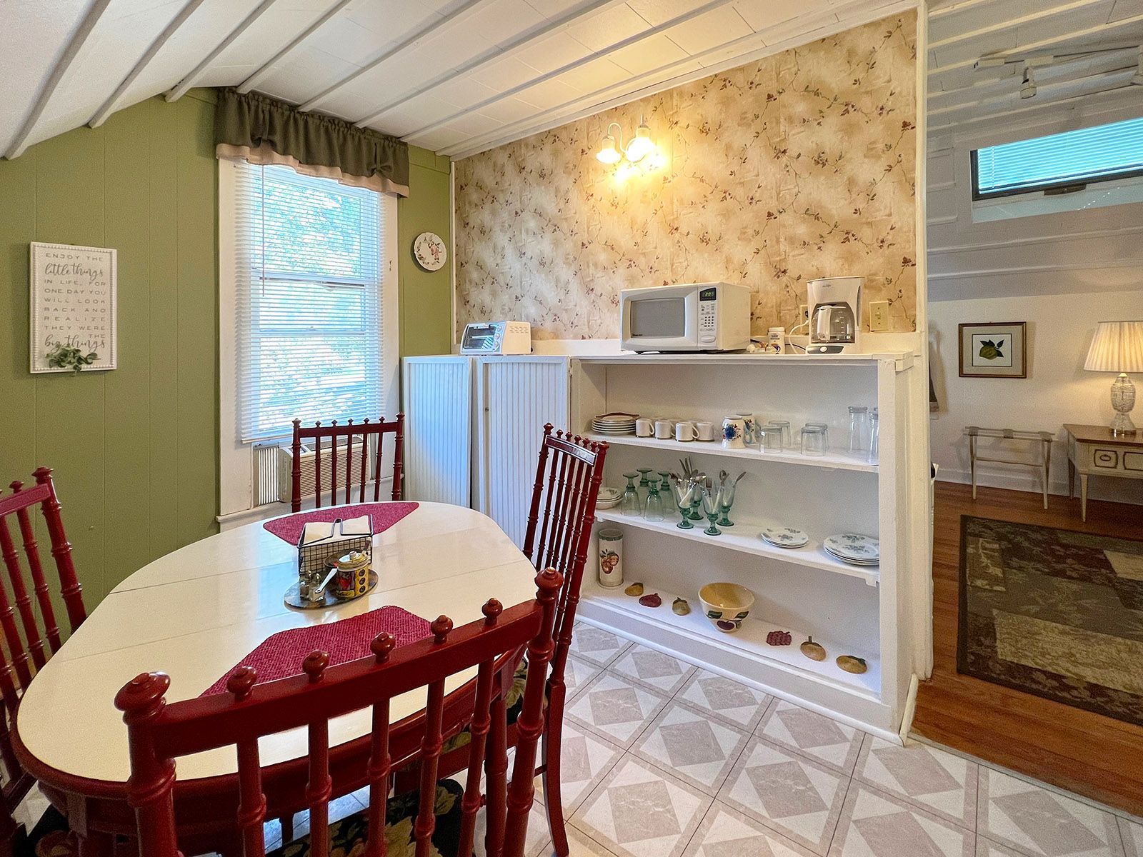 View of kitchenette and appliances and table