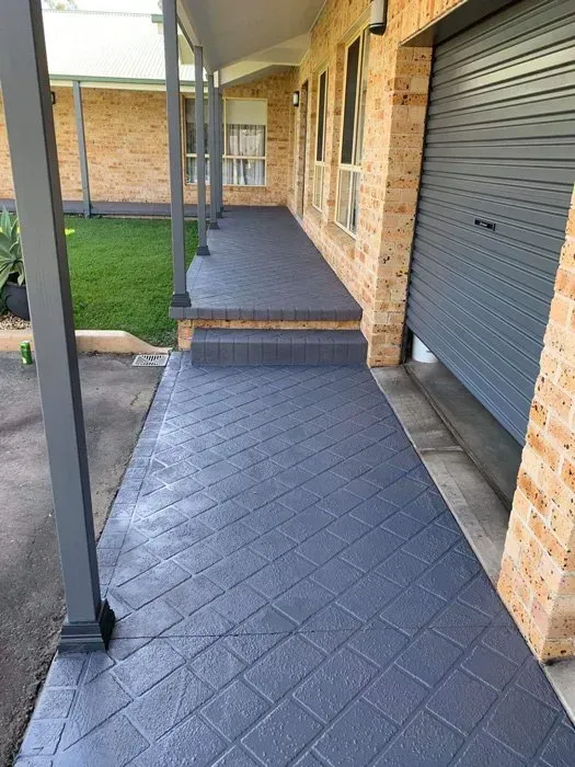 Fresh Concrete Walkway Along a House Under Construction — BJ's Concreting in North Nowra, NSW