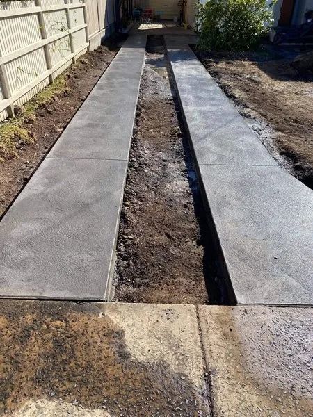 Freshly Poured Concrete Driveway With Two Long Slabs — BJ's Concreting in North Nowra, NSW