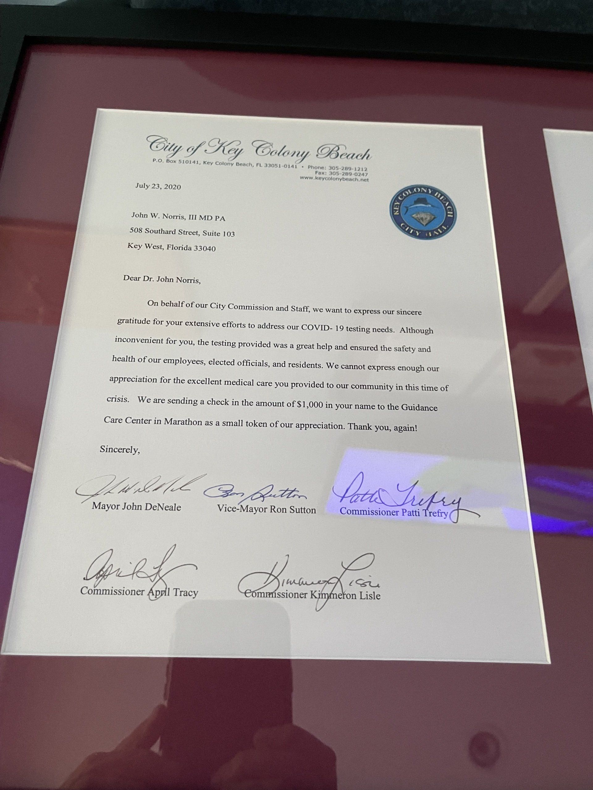Framed letter from the City of Key Biscayne.