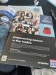 A magazine is open to an article about empowering women in the trades