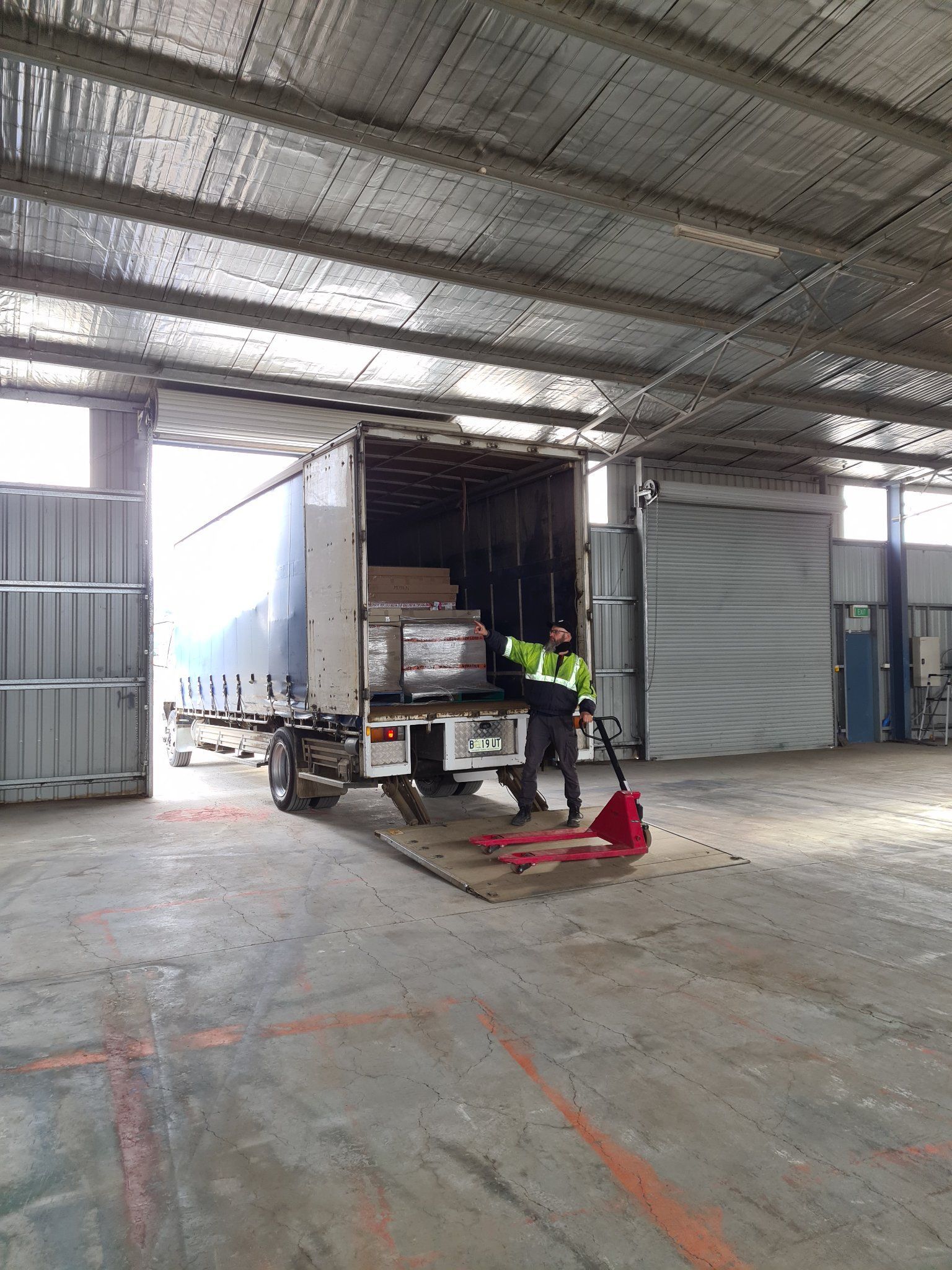 Warehouse truck unloading scene