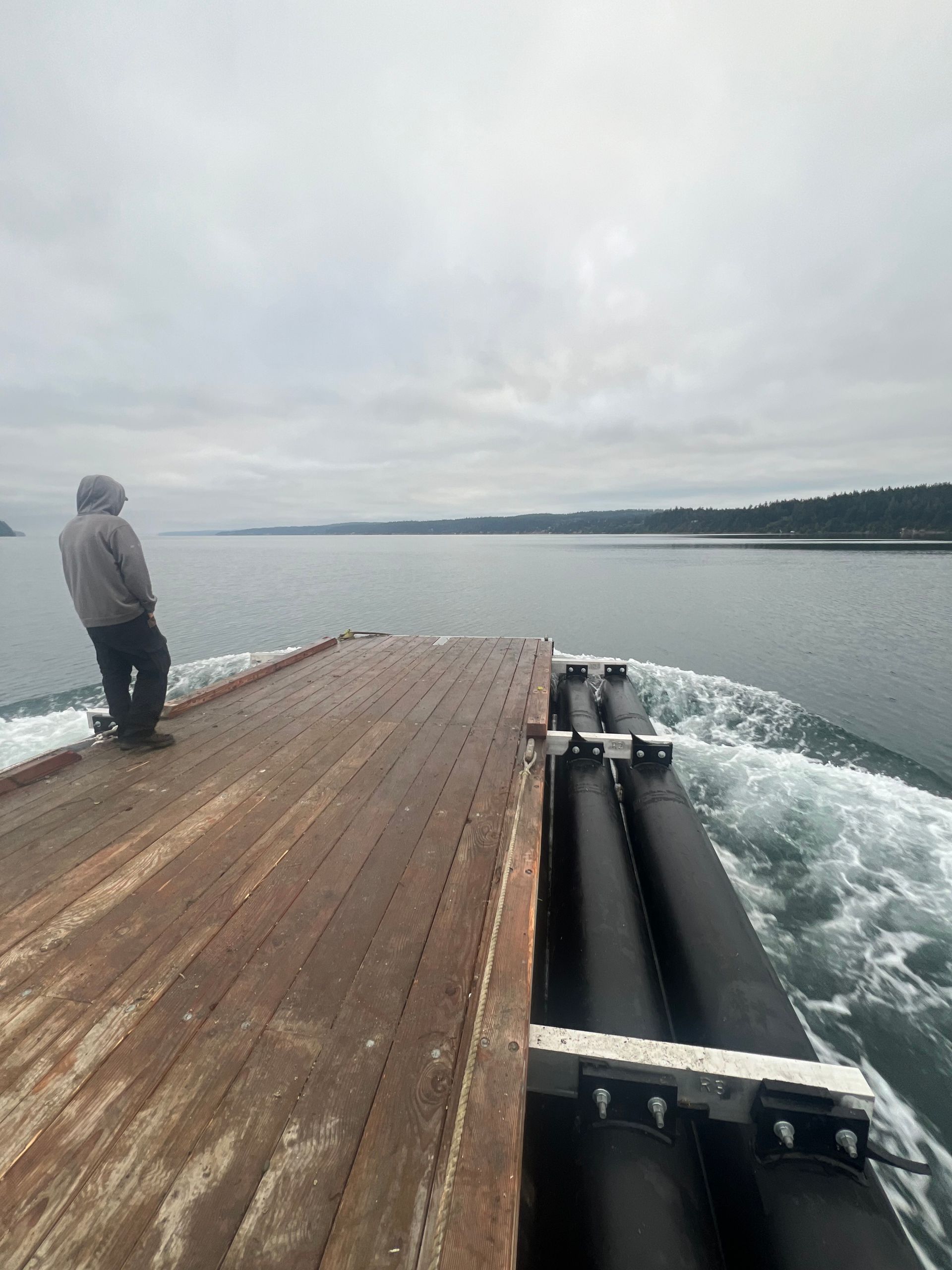 Aerial view of barge staging area in Puget Sound cove