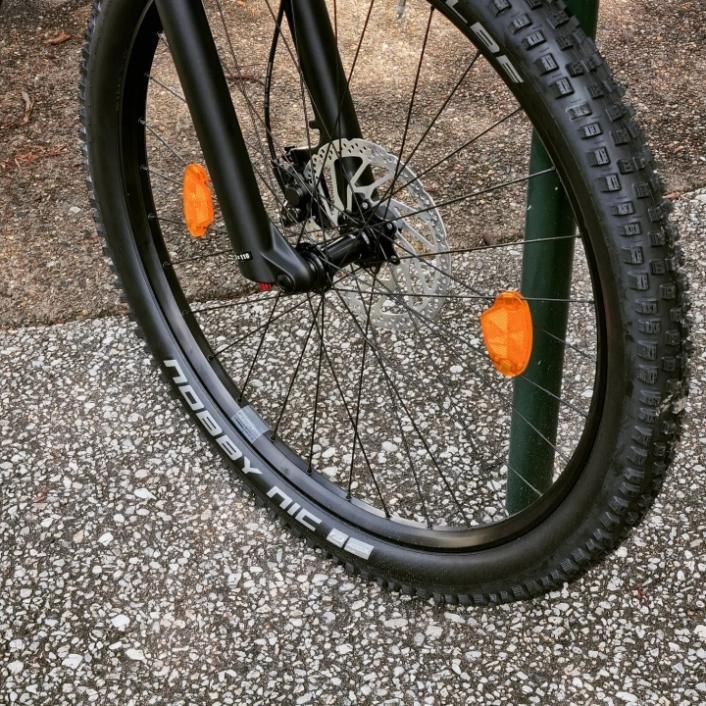 A Close Up Of A Bicycle Wheel With The Word Agility On It — Trinity Cycle Works In Cairns City, QLD