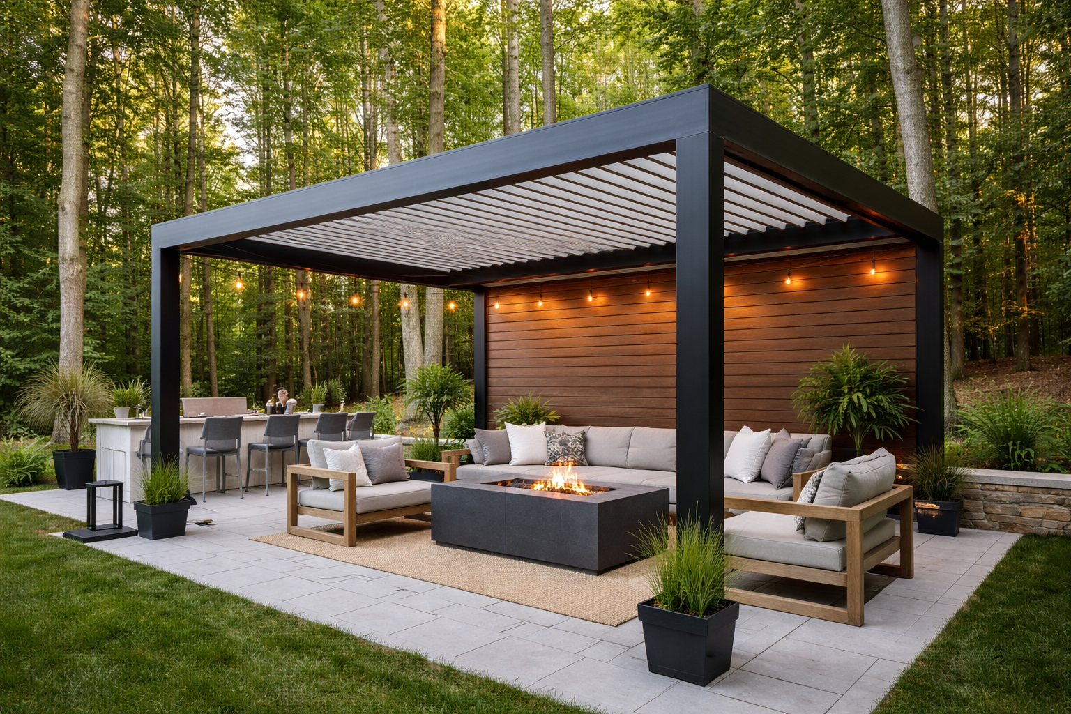 Outdoor patio with black pergola, seating area with fire pit, and bar in a wooded setting.