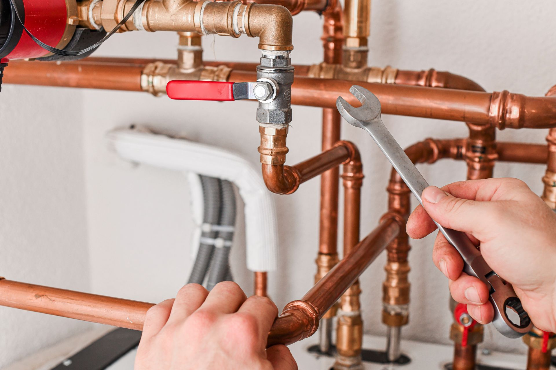 Fixing a water valve by an emergency heating contractor. Fixing a water valve by an emergency heating contractor.