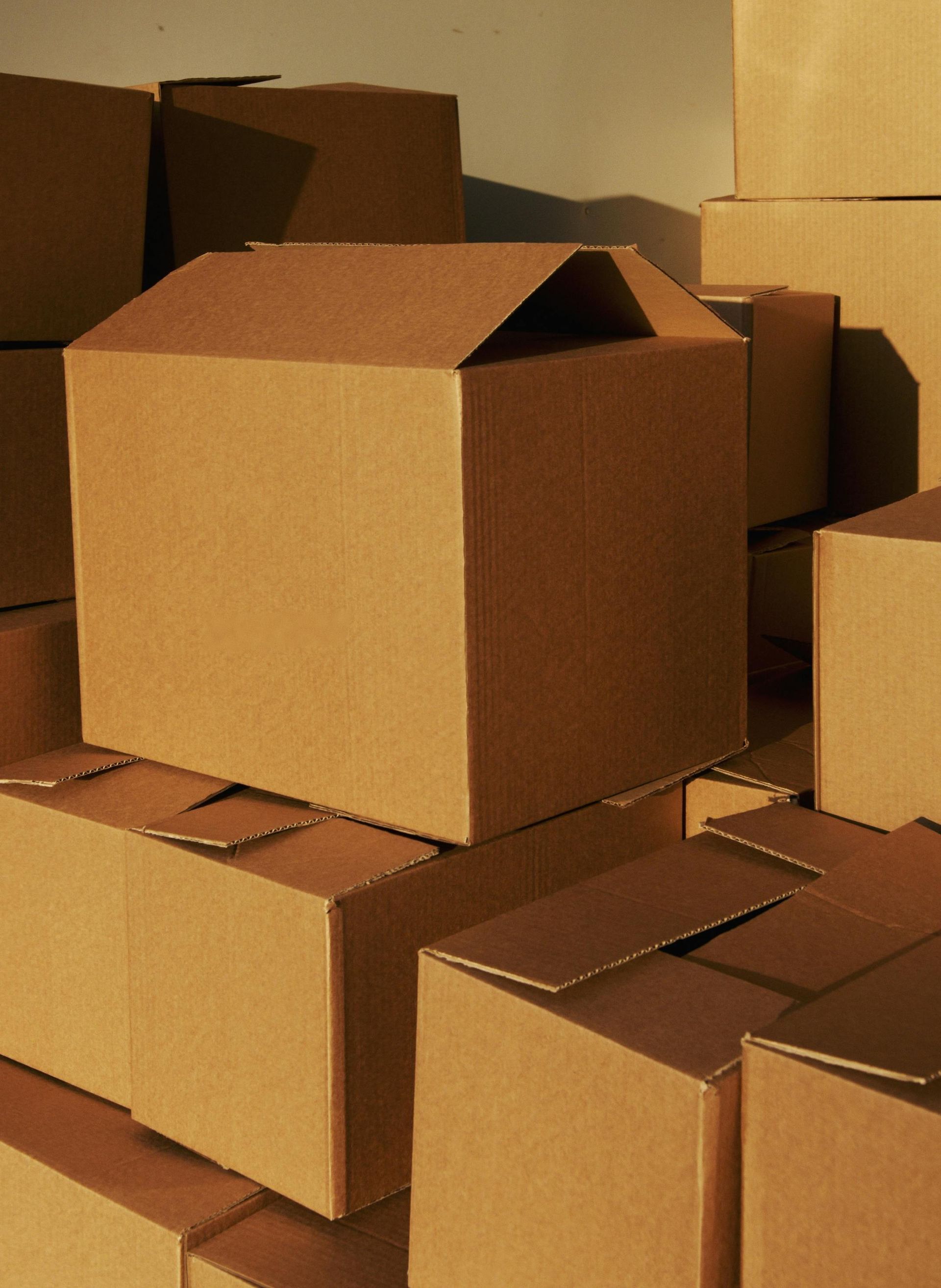 A pile of cardboard boxes stacked on top of each other