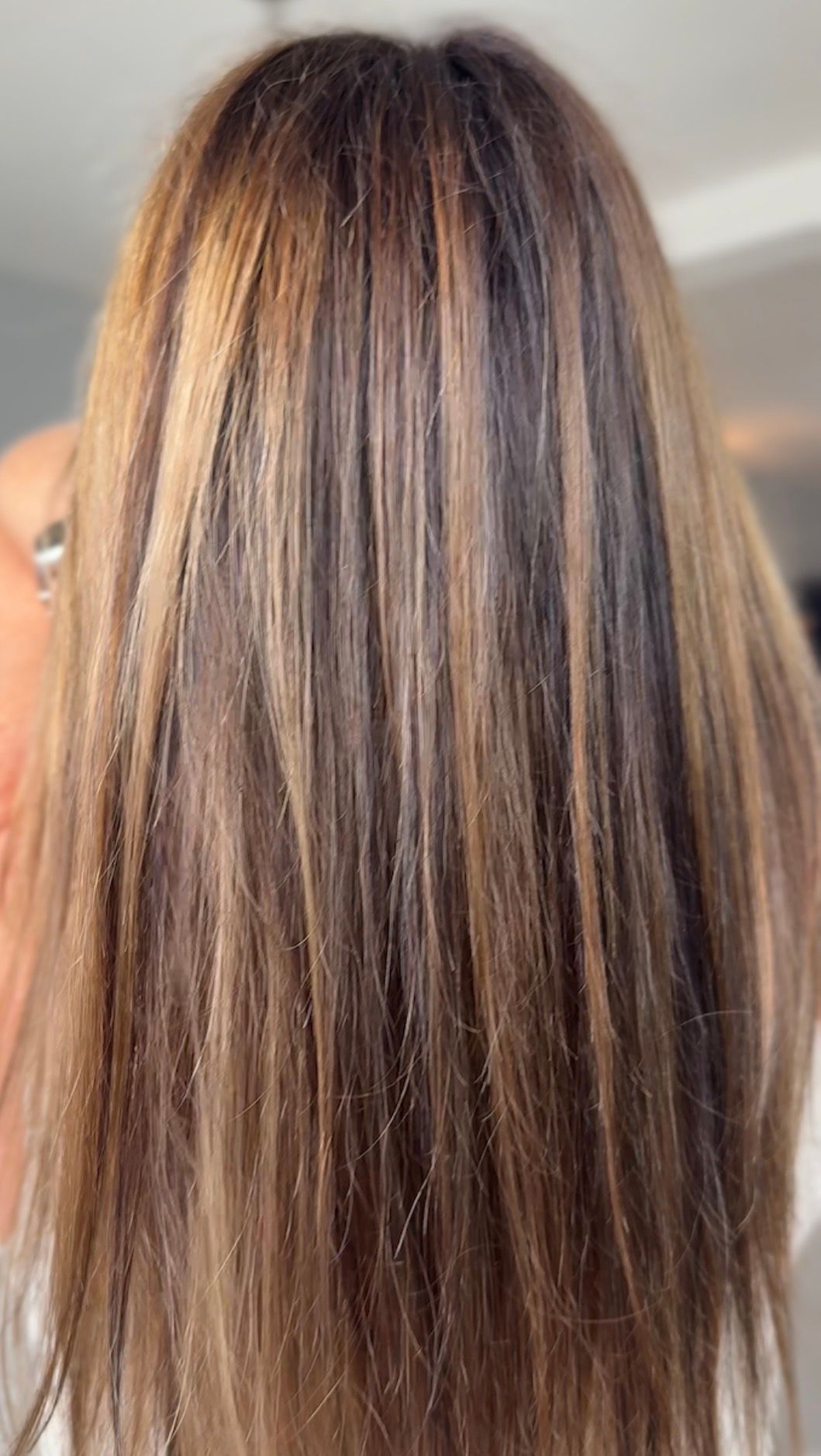Brunette balayage with warm caramel ribbons at The Pamper Lounge