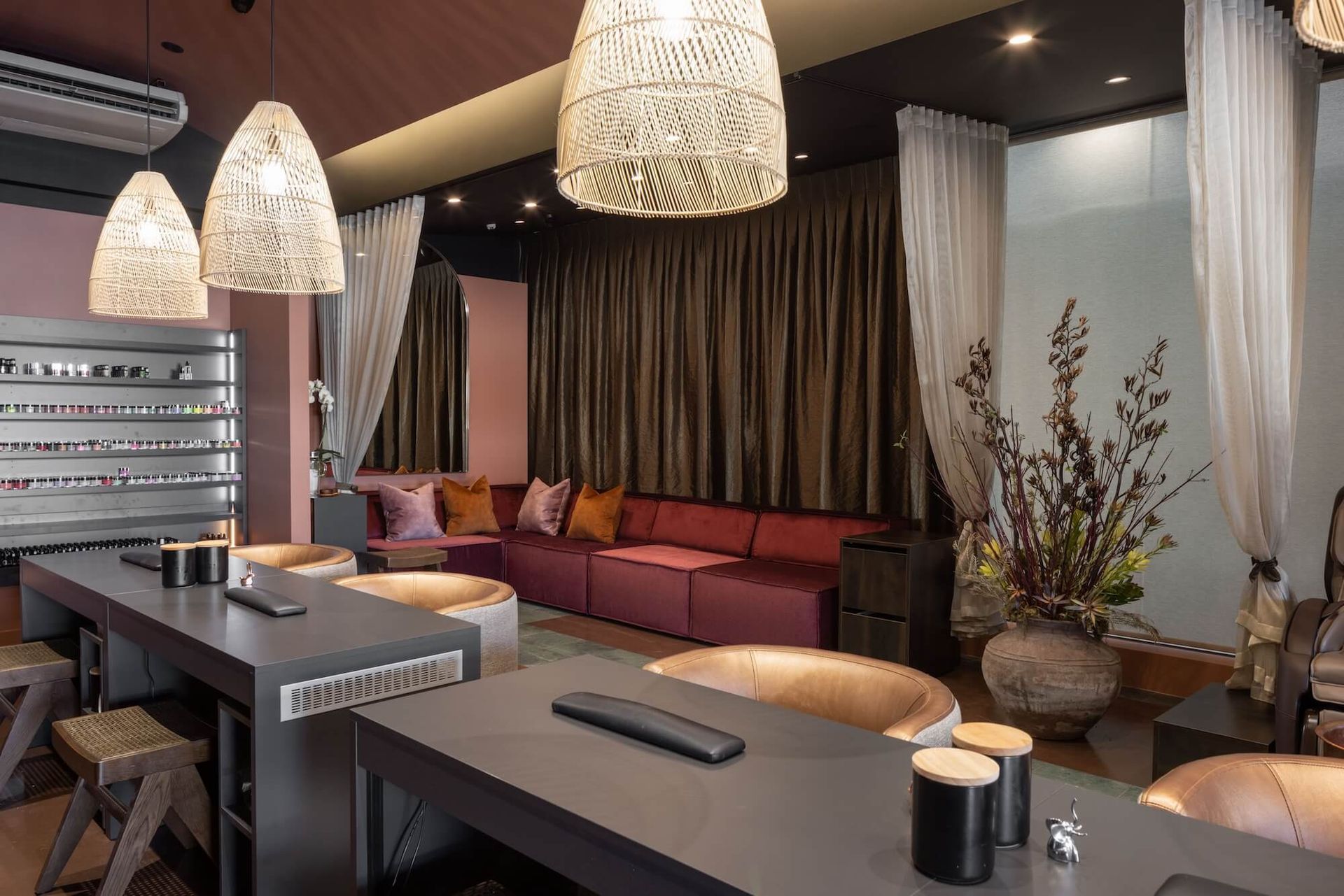 A room with a couch and a table in it. Statement Homes Christchurch