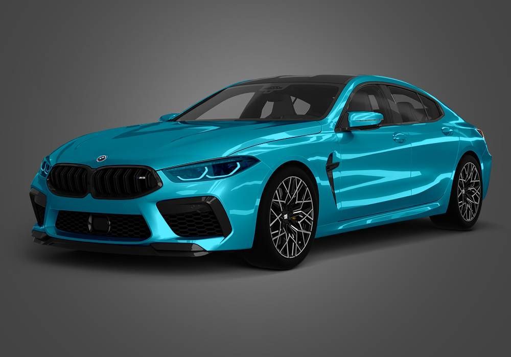 Blue BMW sports coupe on a gray studio background