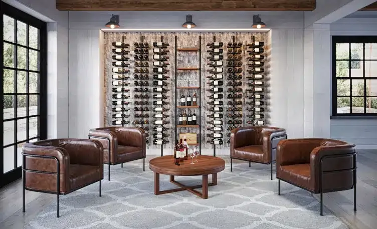 Elegant wine room with leather chairs, round table, and a large glass display of wine bottles