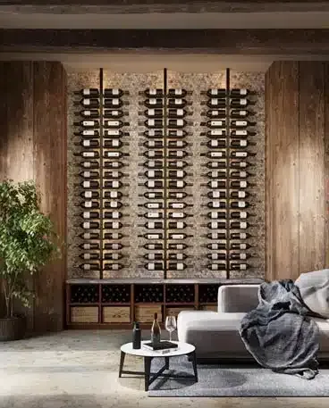 Modern living room with a wall of wine racks, sofa, coffee table, and potted plant