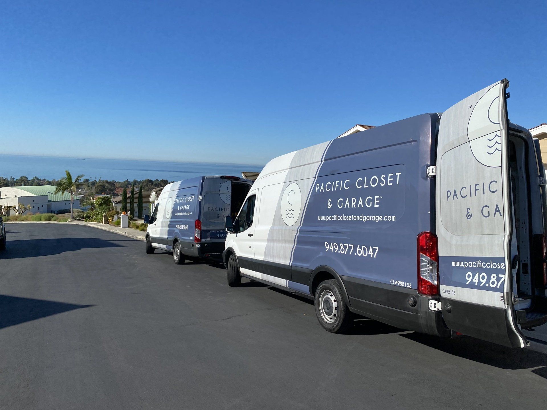 Pacific Closet and Garage van at a client project location with open doors .