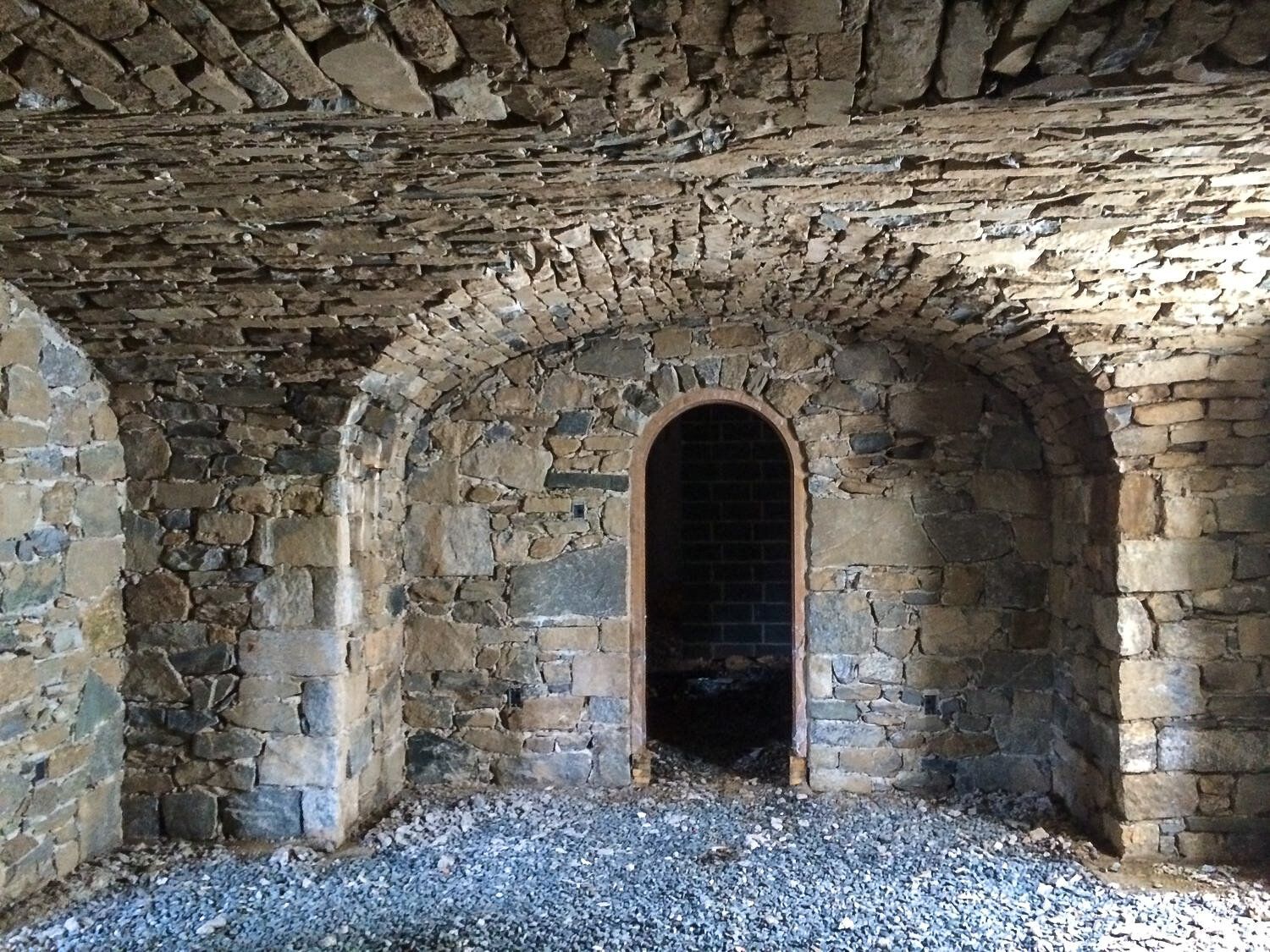 There is a doorway in the middle of the room.