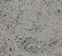 Speckled light gray granite surface with black and brown flecks