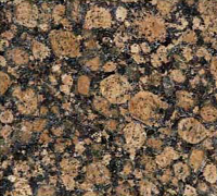 Close-up of mottled brown and black granite stone surface