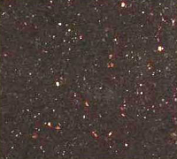 Dark speckled background with scattered red, white, and orange specks