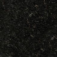 Dark black speckled stone or granite surface texture