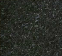 Dark speckled stone or granite surface