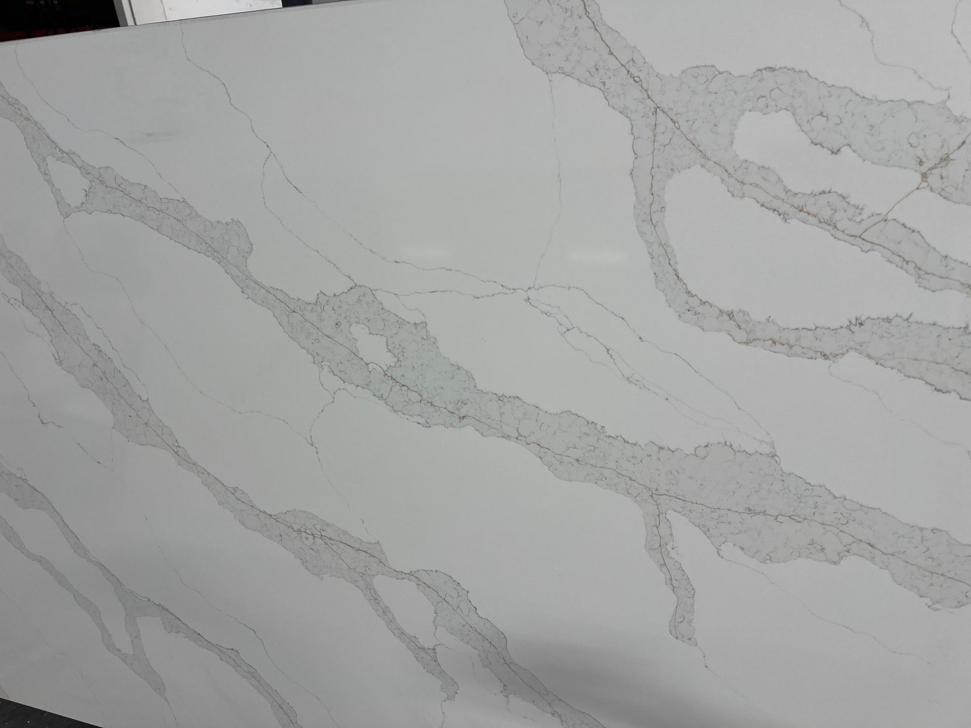 Light gray marble pattern with subtle white veining across the surface