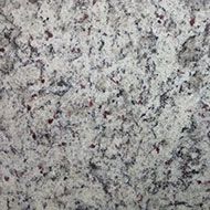 Speckled gray granite surface with black, white, and pink flecks