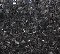 Dark speckled black and gray stone surface texture