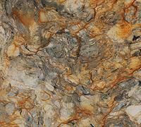 Abstract marbled stone texture in gray, tan, and orange tones