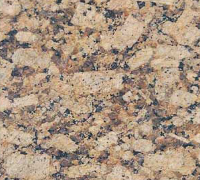 Close-up of speckled beige, pink, and black granite stone texture
