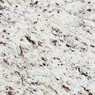 White granite surface with black and brown speckles