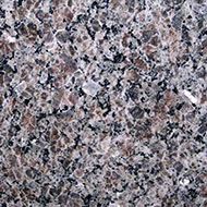 Close-up of speckled gray, pink, and black granite texture