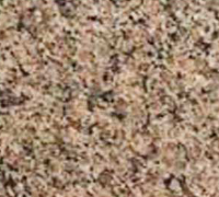 Close-up of a speckled beige, brown, and pink textured surface