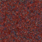 Abstract red, brown, and black speckled textured pattern