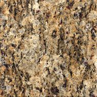 Close-up of beige and brown speckled granite stone texture