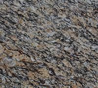 Close-up of a speckled gray, brown, and black granite surface with a rough, textured pattern